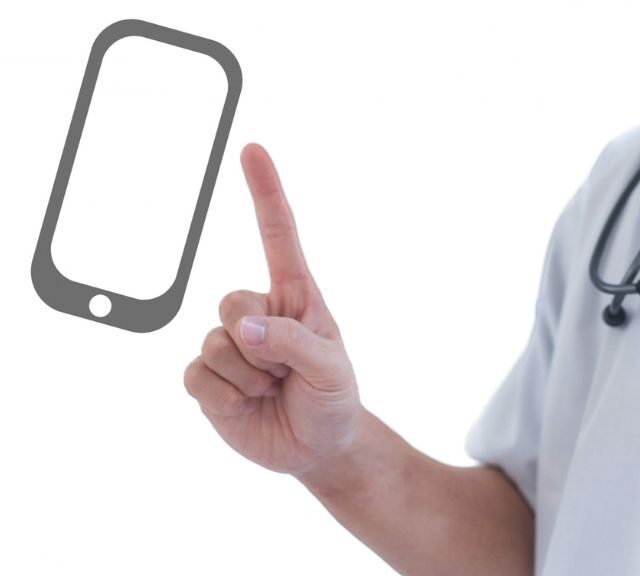 スマートフォンを指さす医師